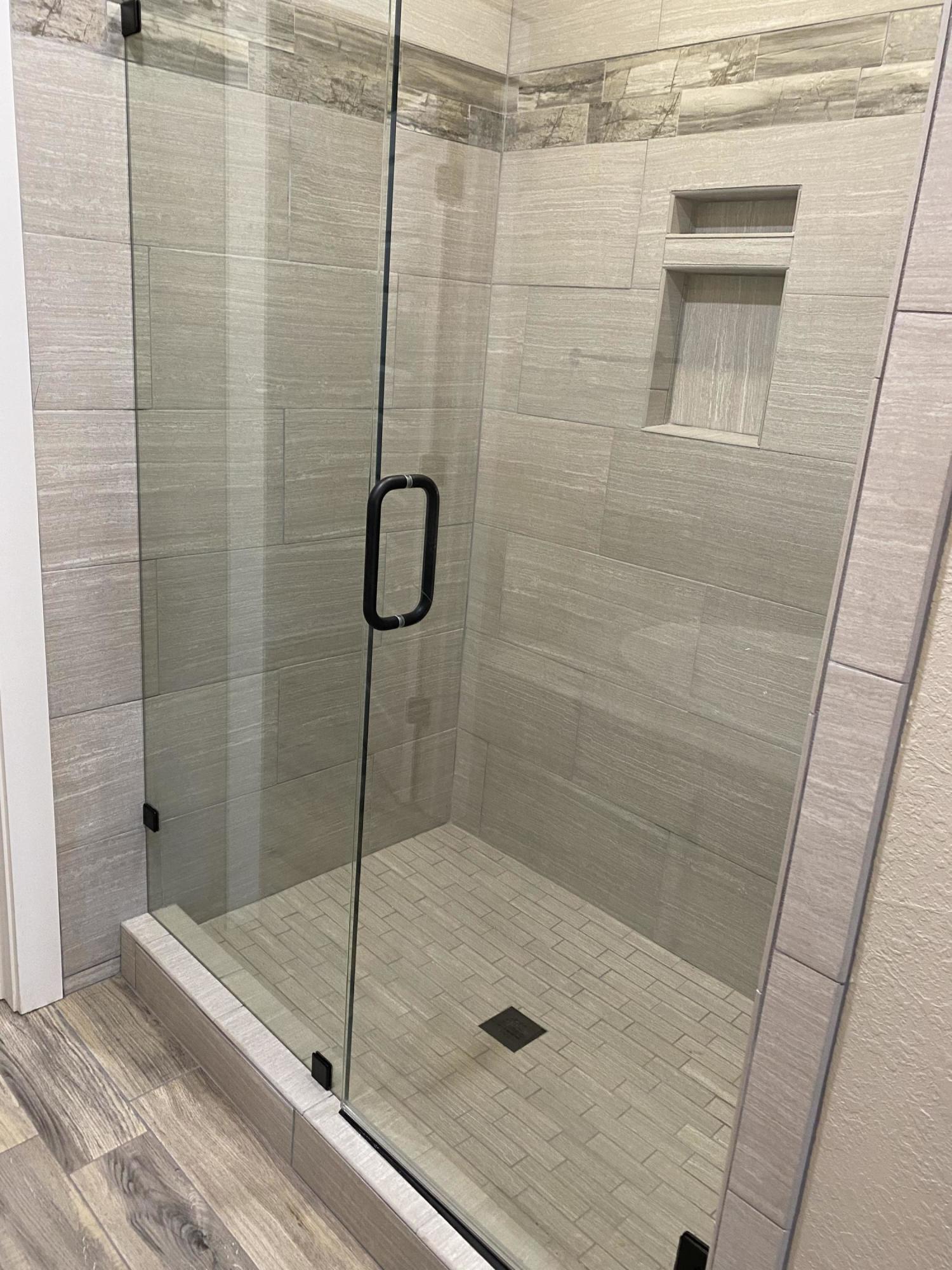 3950 Painter Branch Road Crestview, FL 32539 - Photo 11 of 18 a bathroom with a shower