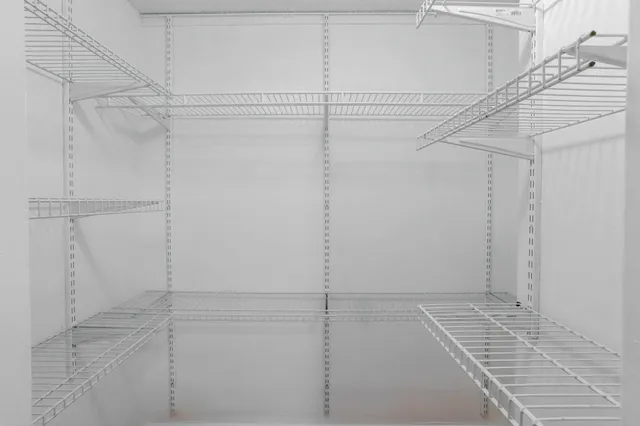 a view of a room with racks on the wall