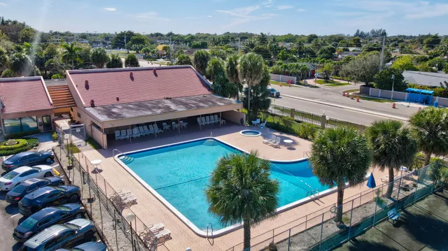 an aerial view of a house with outdoor space
