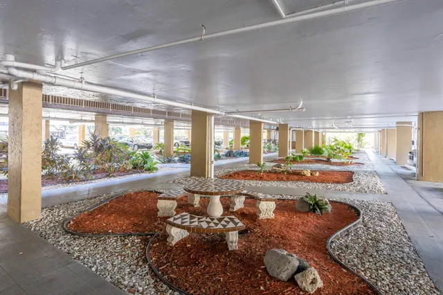 a large room with yard and balcony view
