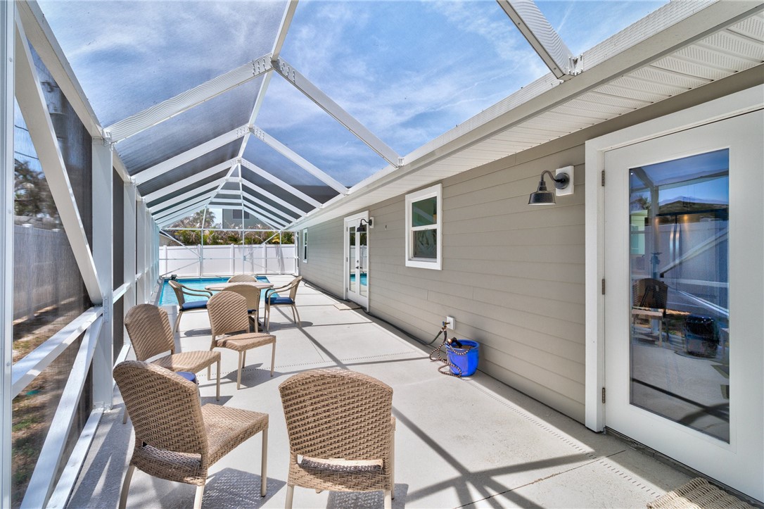 7989 143rd Street Sebastian, FL 32958 - Photo 26 of 30 a living room with furniture and next to a window