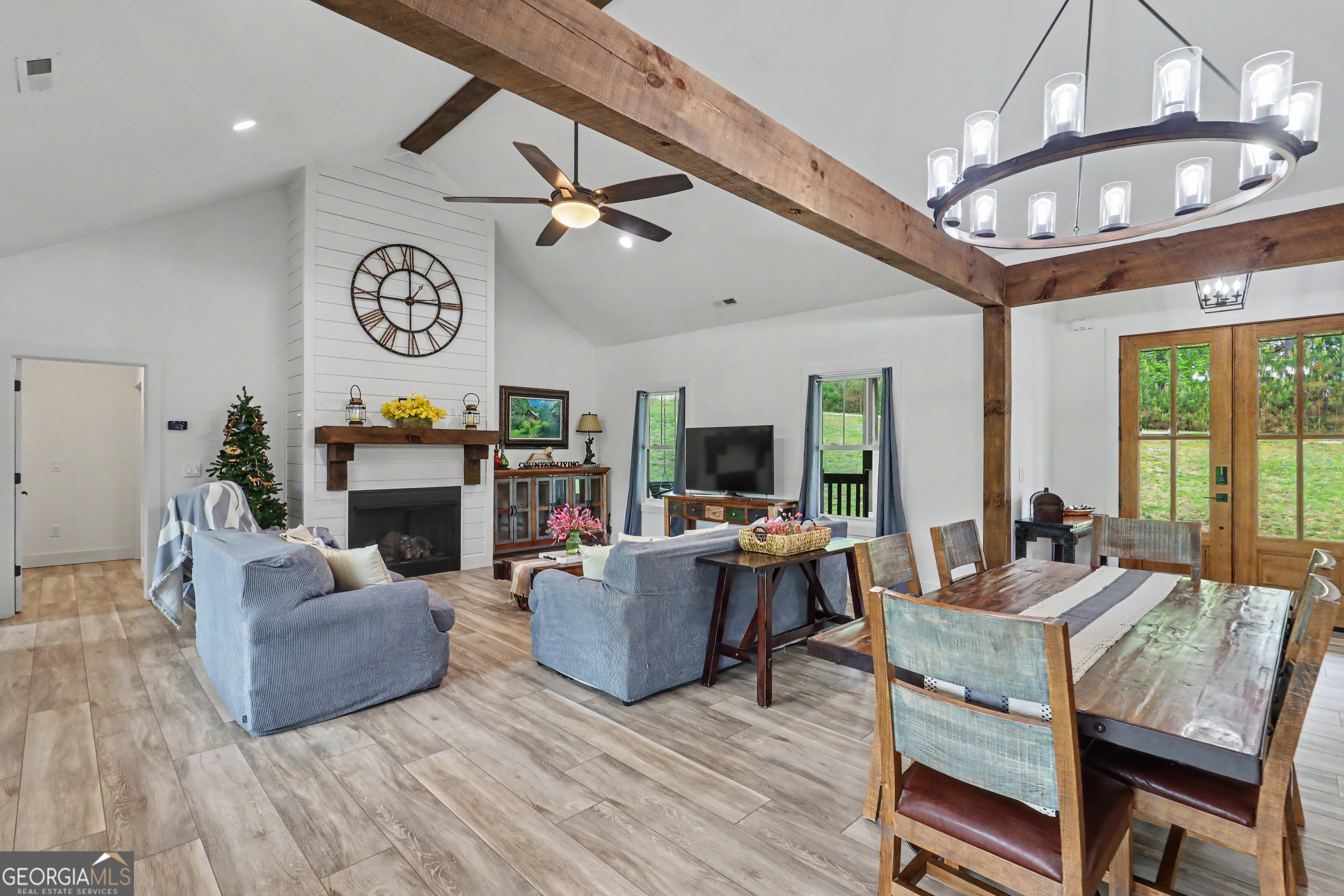 1424 Ridge Pointe Way Blairsville, GA 30512 - Photo 11 of 114 a living room with furniture and a fireplace