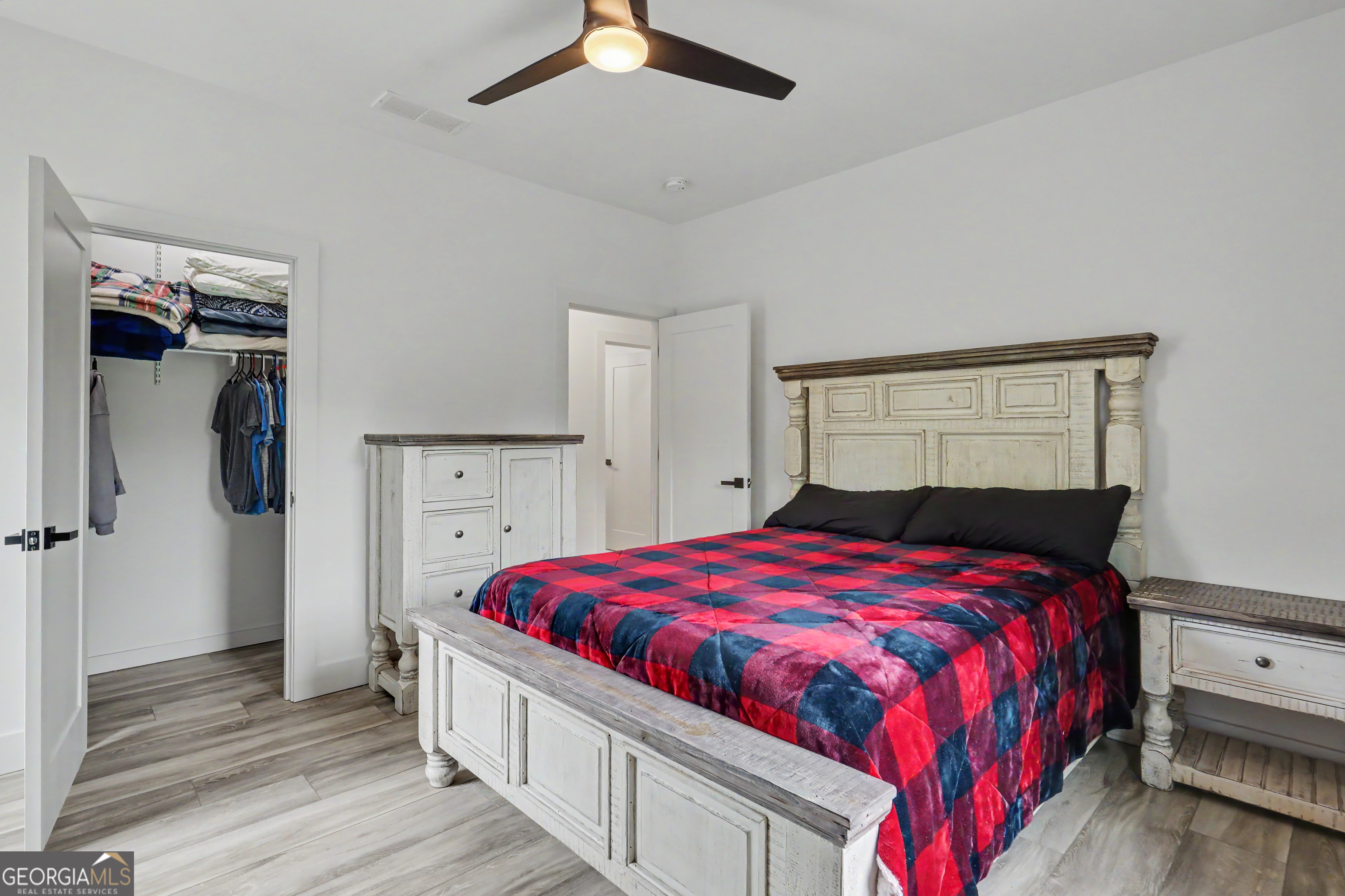 1424 Ridge Pointe Way Blairsville, GA 30512 - Photo 25 of 114 a bedroom with a bed and a window