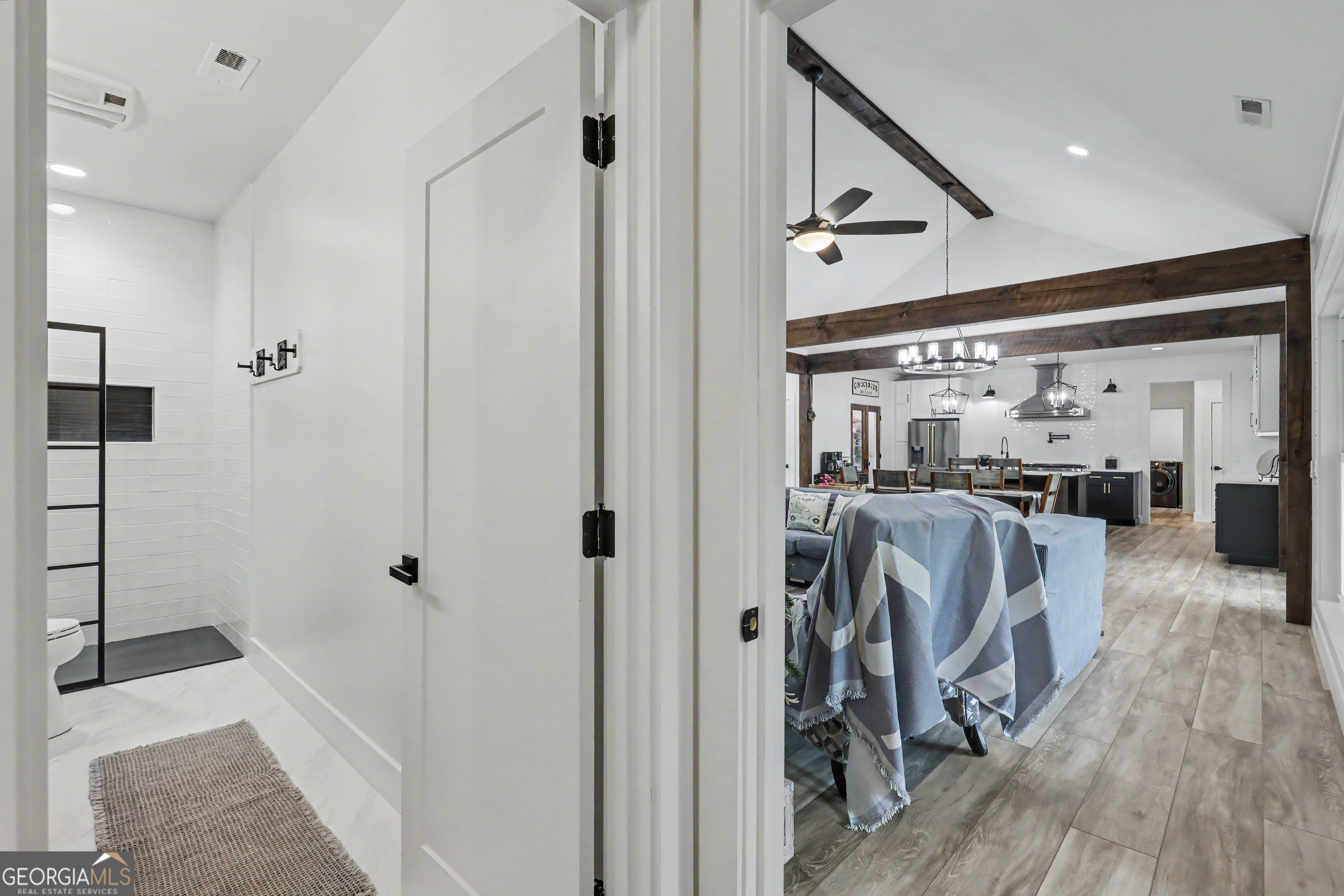 1424 Ridge Pointe Way Blairsville, GA 30512 - Photo 28 of 114 a view of walk in closet with clothes and shoes
