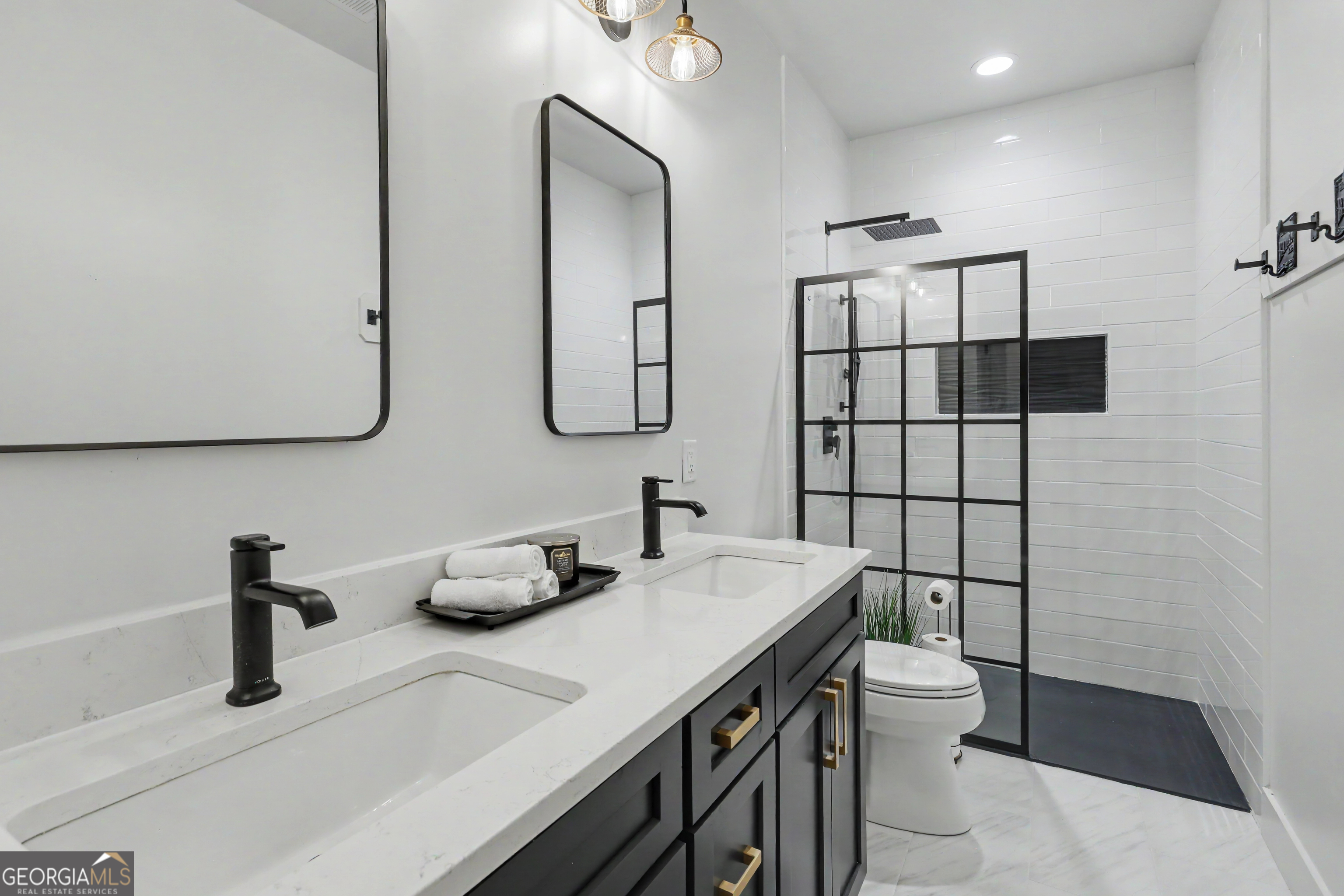 1424 Ridge Pointe Way Blairsville, GA 30512 - Photo 29 of 114 a bathroom with a sink toilet and shower