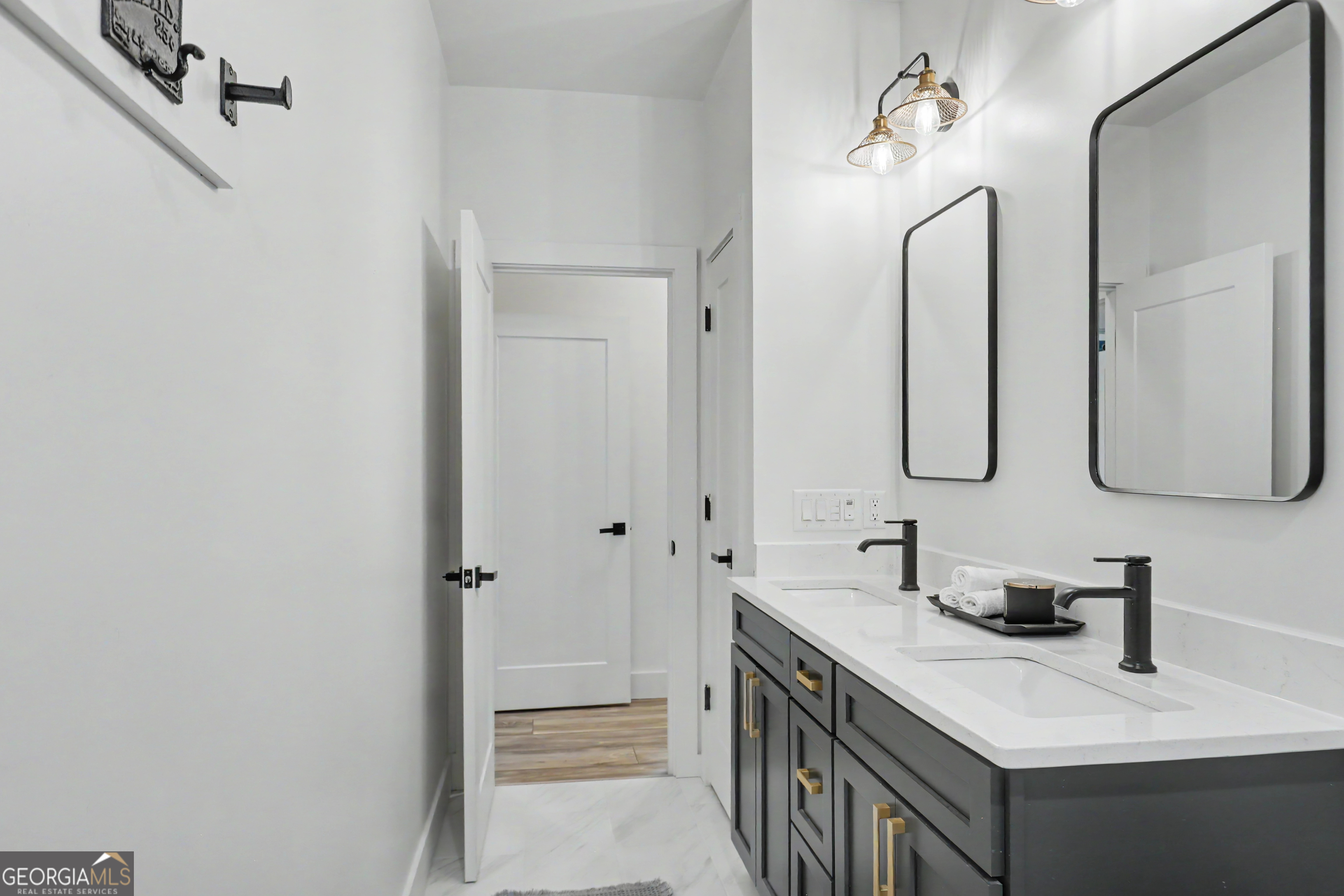 1424 Ridge Pointe Way Blairsville, GA 30512 - Photo 30 of 114 a bathroom with double vanity sink and a mirror