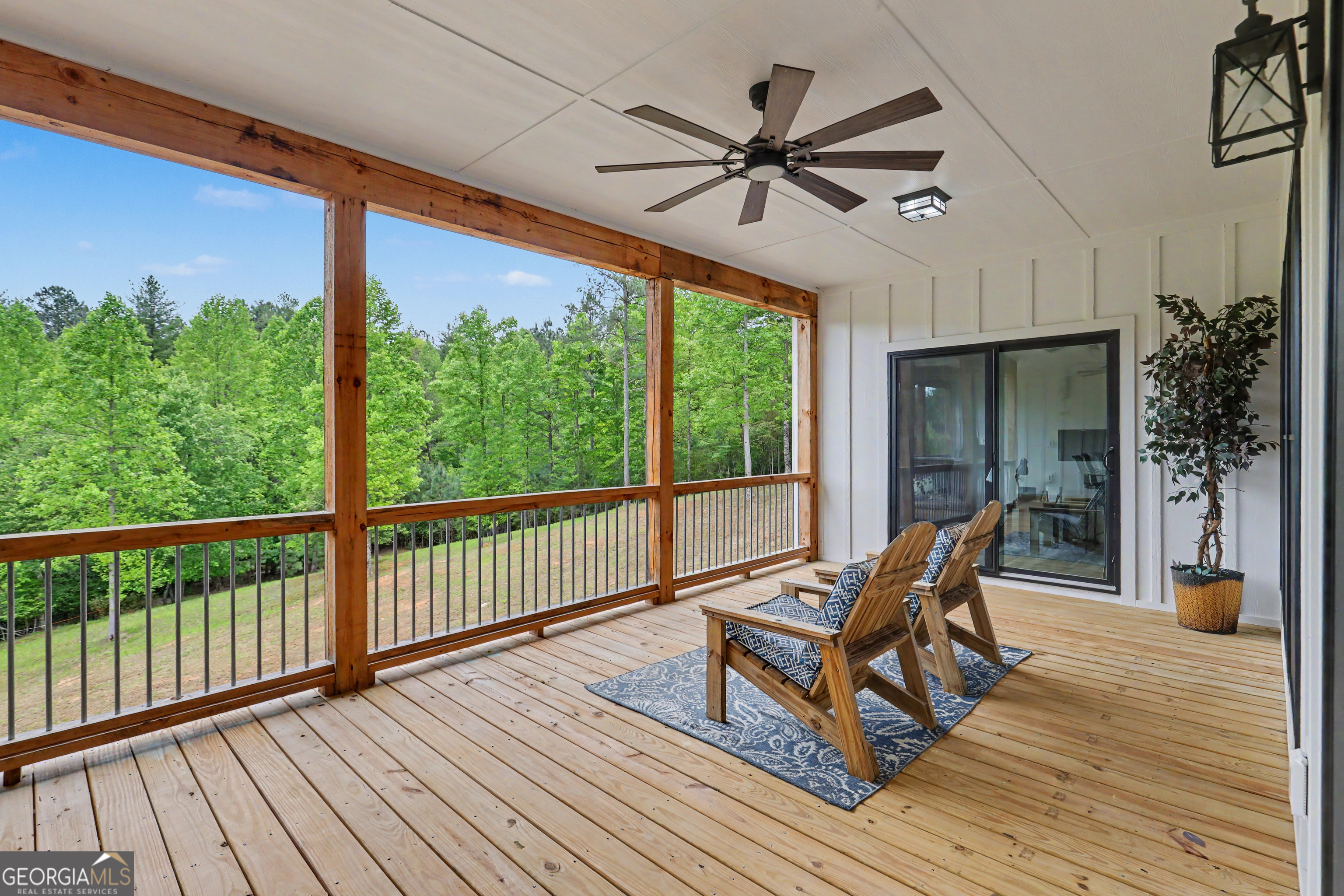 1424 Ridge Pointe Way Blairsville, GA 30512 - Photo 31 of 114 a view of a roof deck with chair and wooden floor