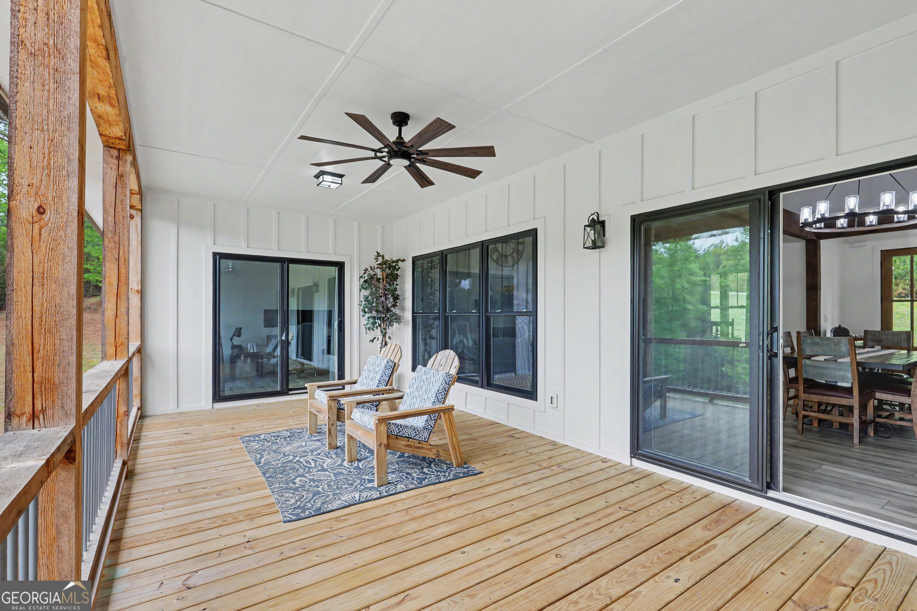 1424 Ridge Pointe Way Blairsville, GA 30512 - Photo 32 of 114 a living room with furniture a window and a fireplace