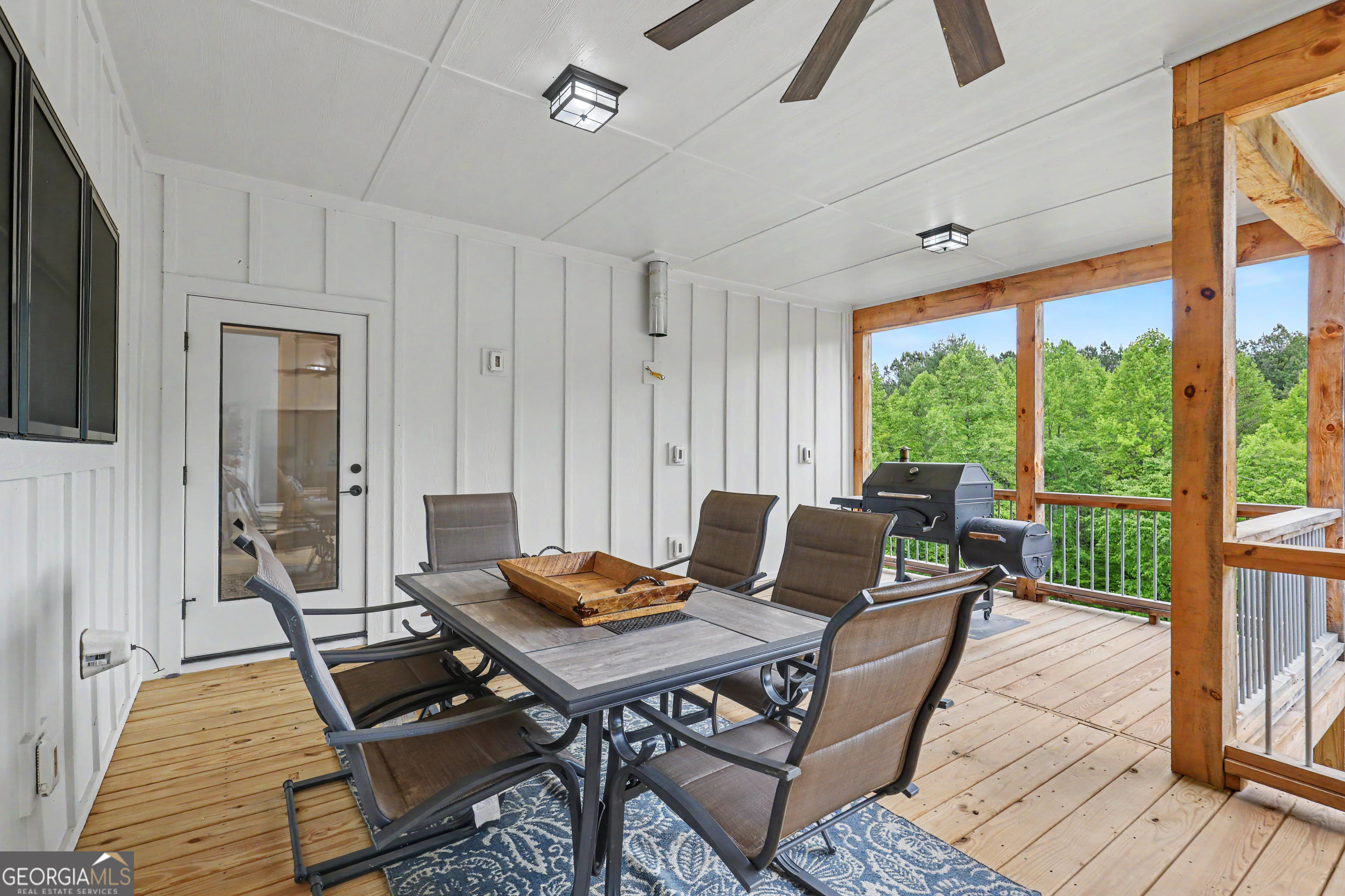 1424 Ridge Pointe Way Blairsville, GA 30512 - Photo 34 of 114 a living room with furniture and a floor to ceiling window