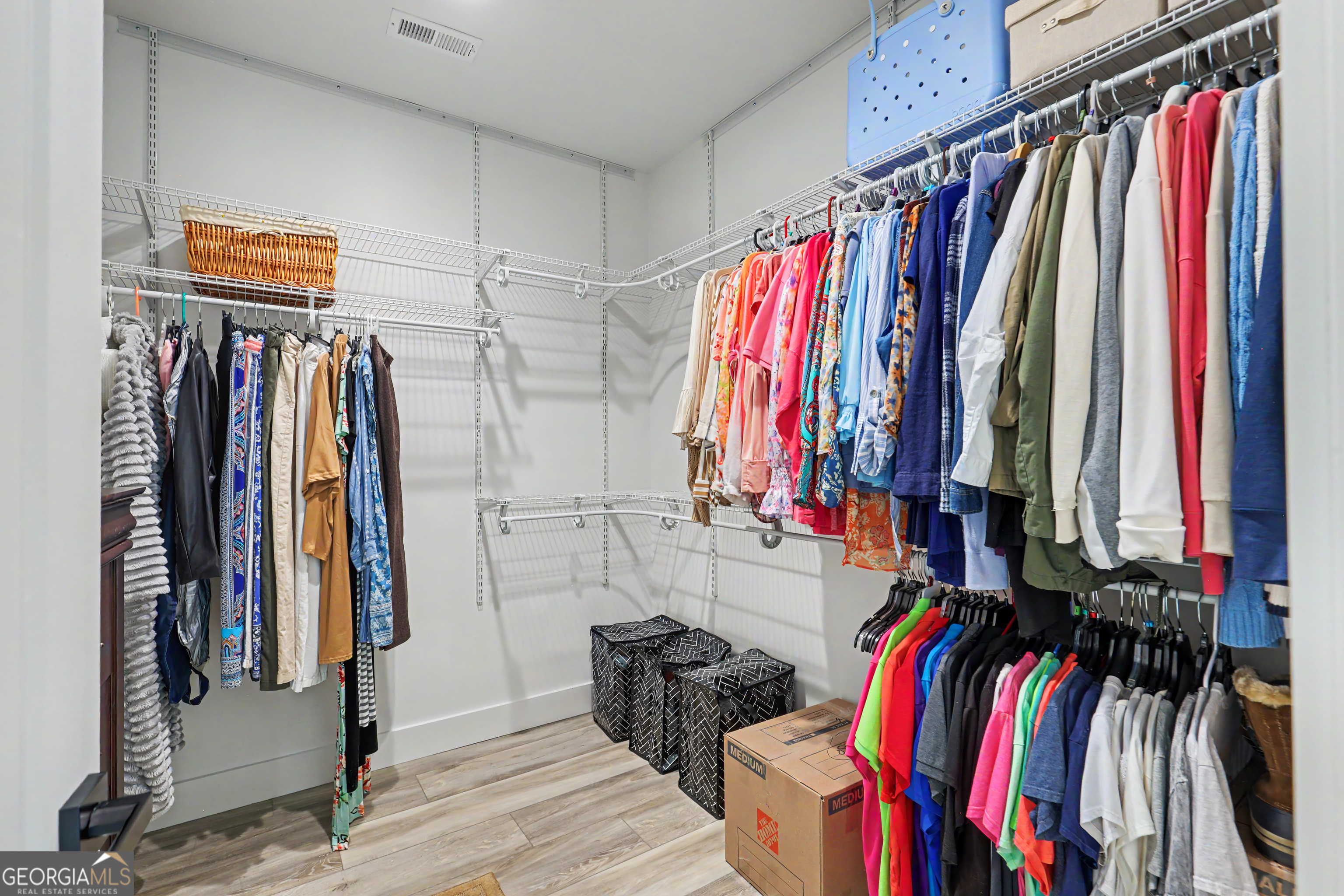 1424 Ridge Pointe Way Blairsville, GA 30512 - Photo 42 of 114 a view of walk in closet with clothes