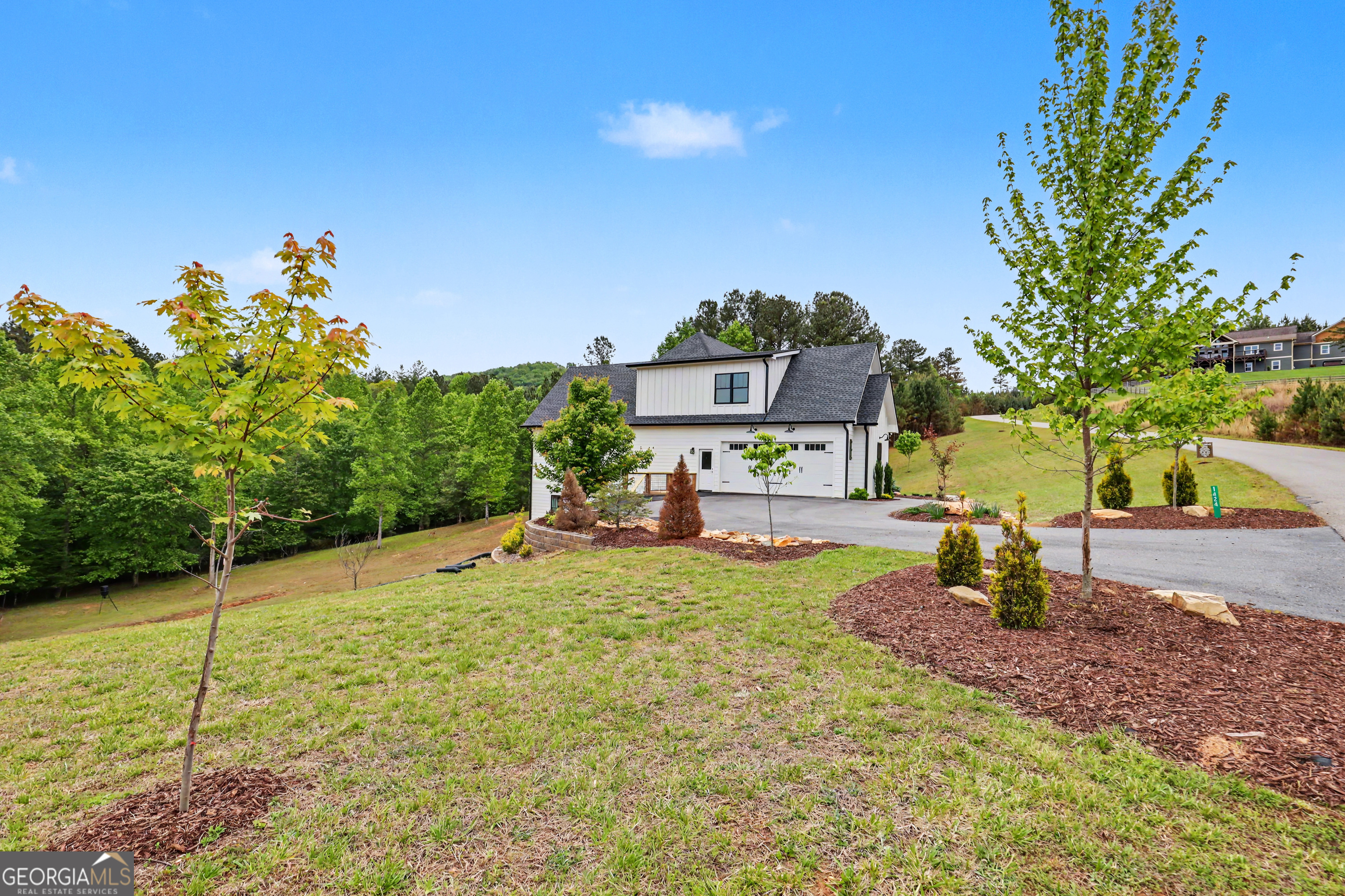 1424 Ridge Pointe Way Blairsville, GA 30512 - Photo 5 of 114 a view of a park with swings and slides