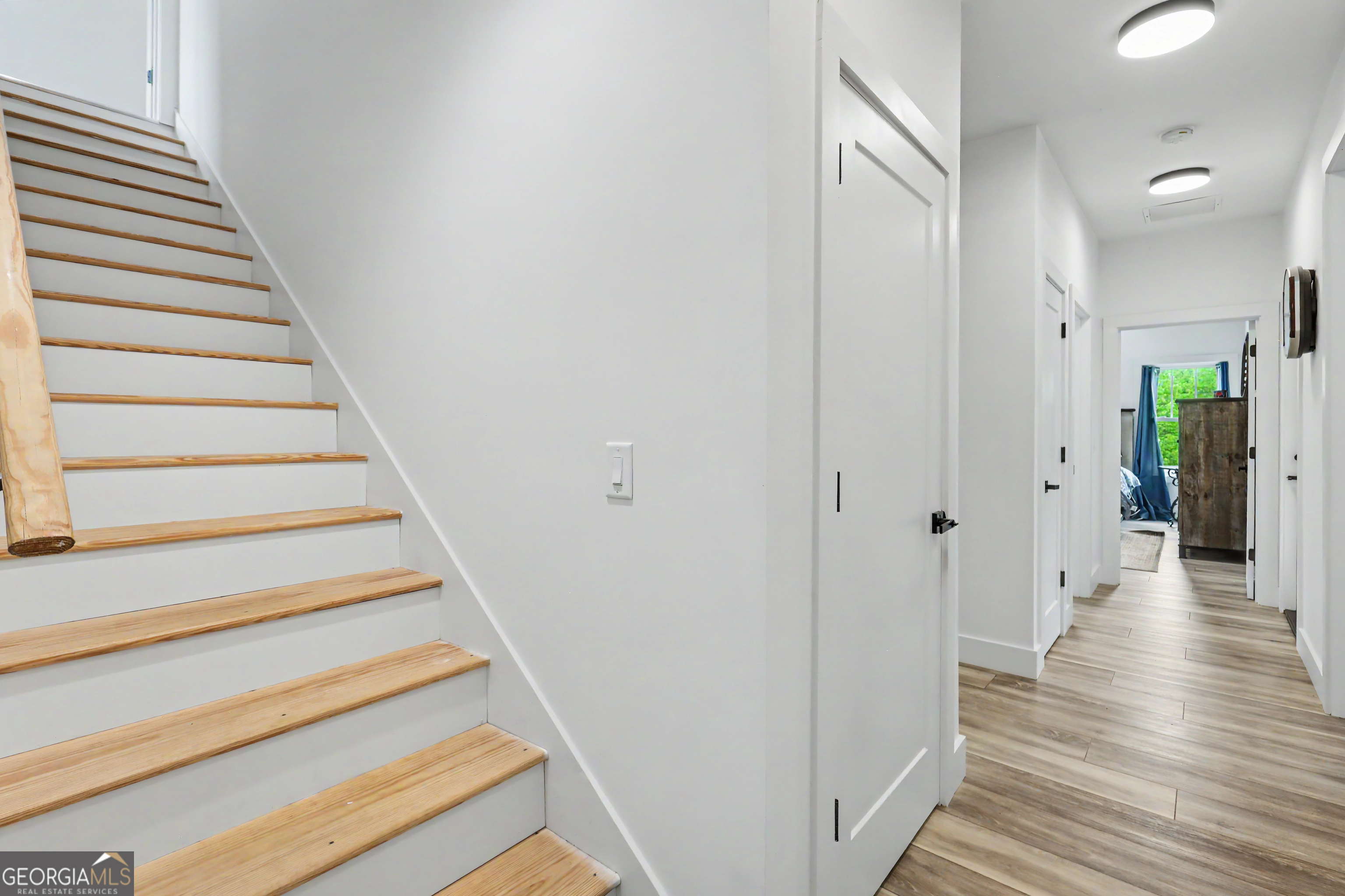 1424 Ridge Pointe Way Blairsville, GA 30512 - Photo 53 of 114 a view of a hallway with wooden floor and entryway