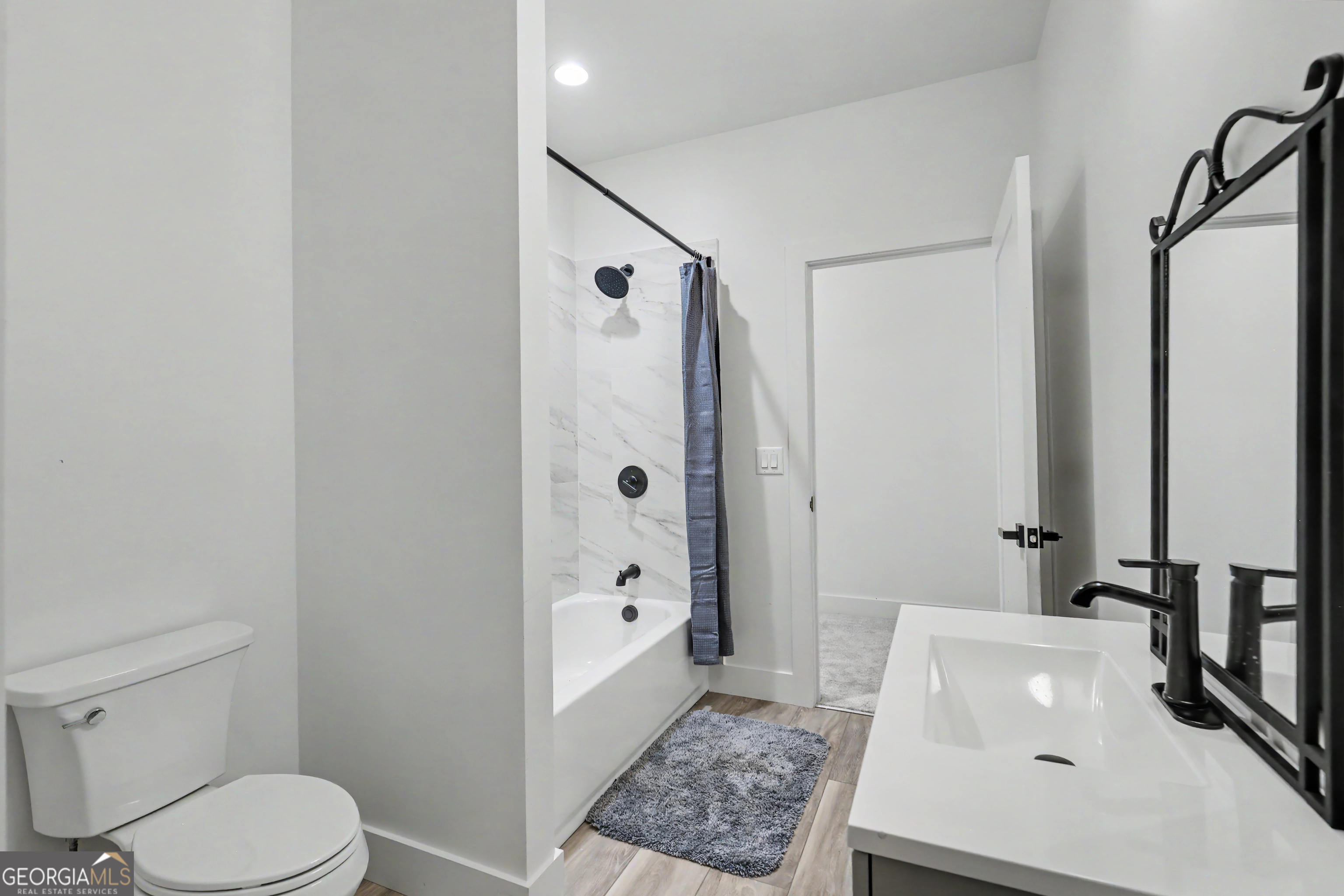 1424 Ridge Pointe Way Blairsville, GA 30512 - Photo 58 of 114 a bathroom with a sink a toilet and shower