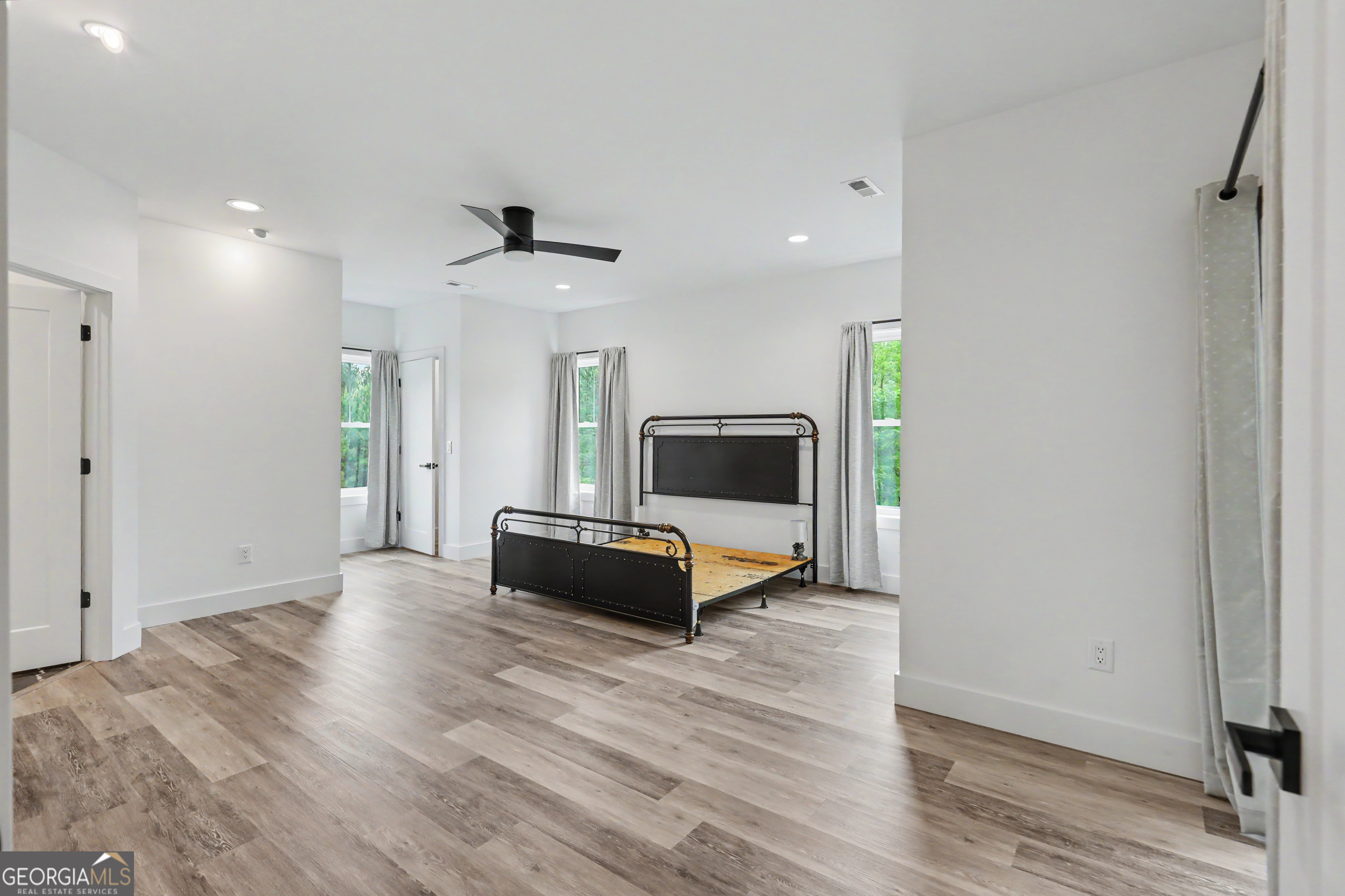 1424 Ridge Pointe Way Blairsville, GA 30512 - Photo 68 of 114 a living room with furniture and a wooden floor