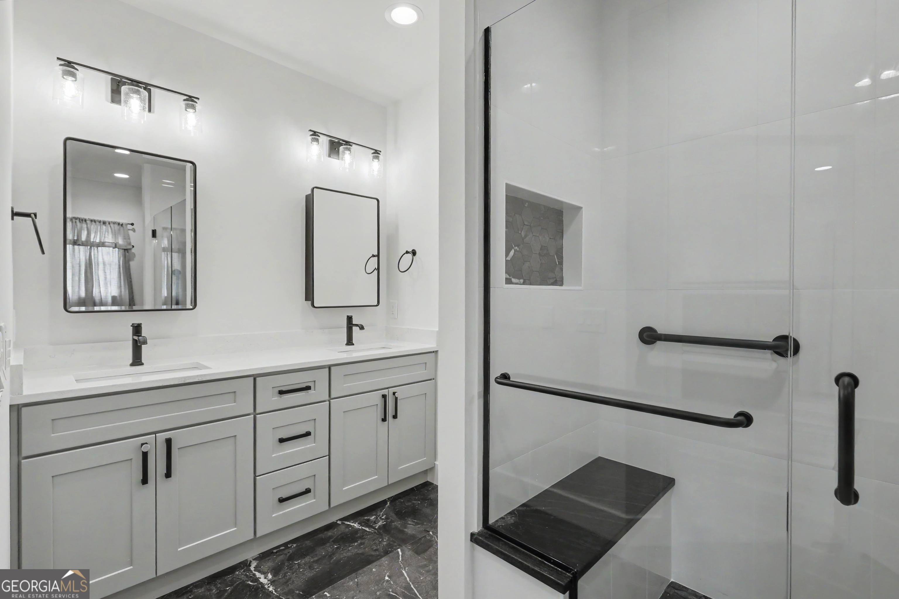 1424 Ridge Pointe Way Blairsville, GA 30512 - Photo 72 of 114 a bathroom with a double vanity sink a mirror and shower