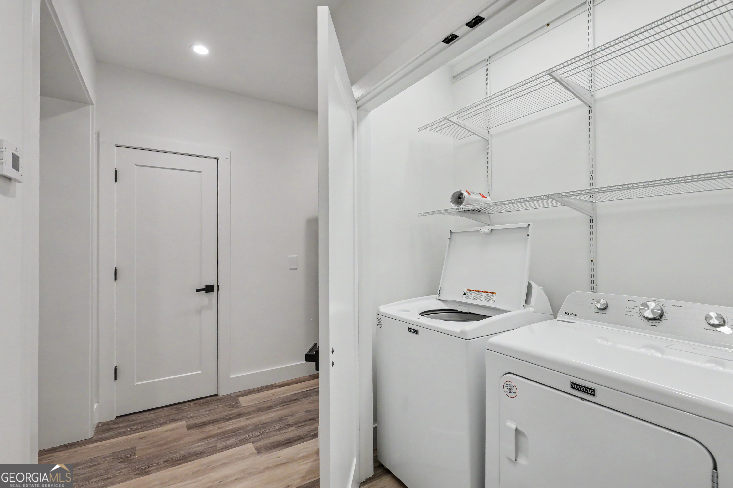 1424 Ridge Pointe Way Blairsville, GA 30512 - Photo 77 of 114 a view of storage and utility room with washer and dryer