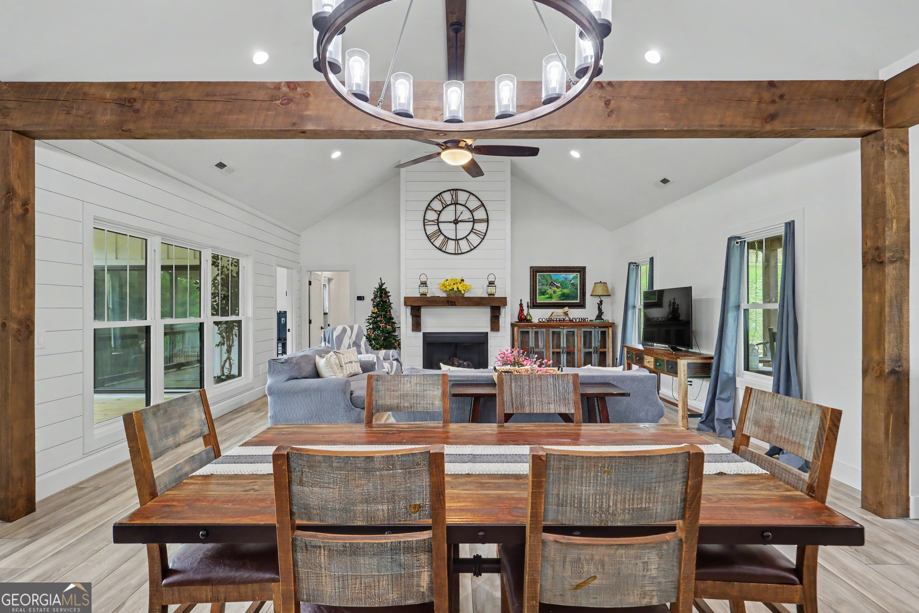 1424 Ridge Pointe Way Blairsville, GA 30512 - Photo 10 of 114 a view of a dining room with furniture a chandelier and wooden floor