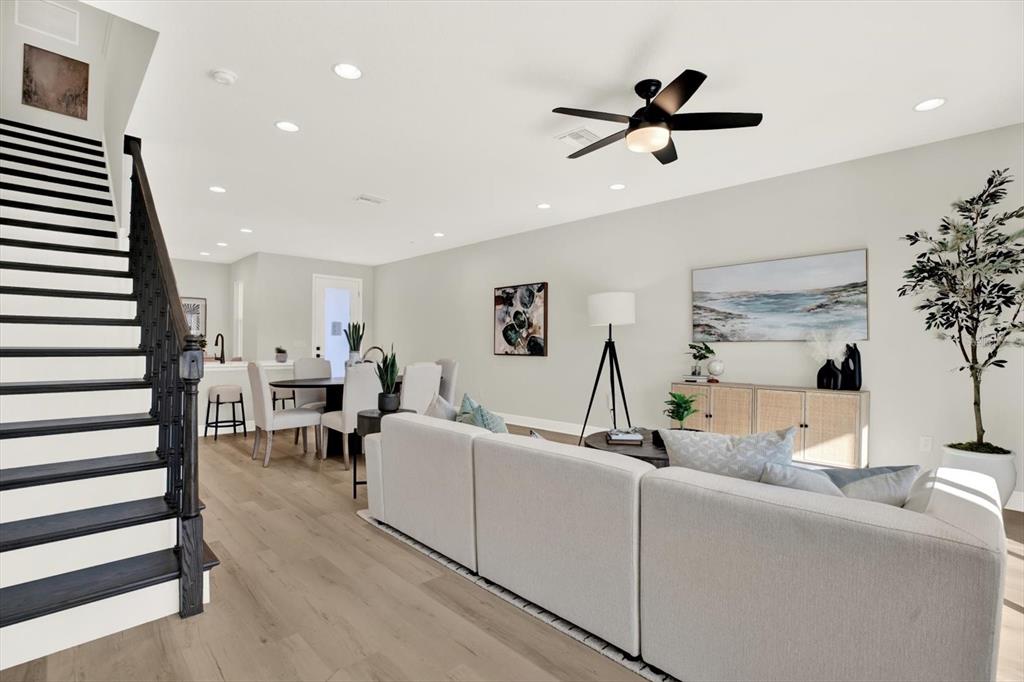 7765 93rd Street North Seminole, FL 33777 - Photo 12 of 29 a living room with furniture and a large window