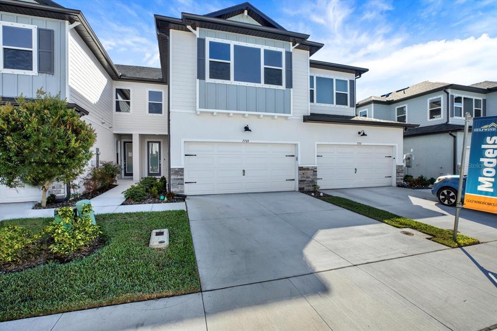 7765 93rd Street North Seminole, FL 33777 - Photo 27 of 29 a view of a house with backyard and plants
