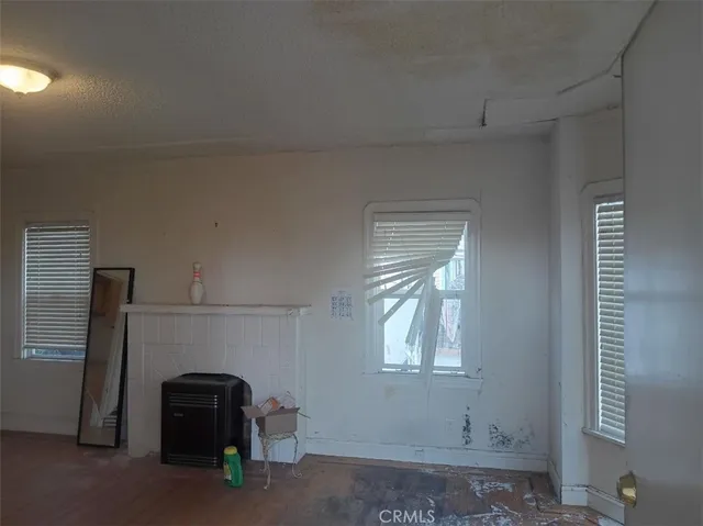 a bathroom with a bathtub and a window