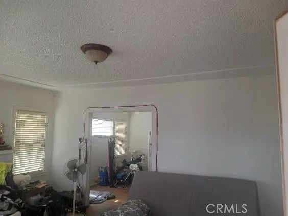 a view of empty room with windows