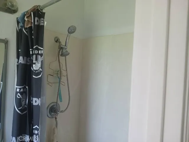 a kitchen with sink and cabinets