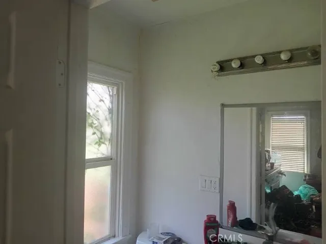 a view of a hallway with closet