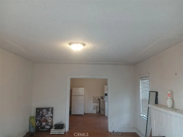 a view of a hallway with closet