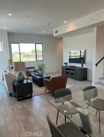 a living room with furniture and window