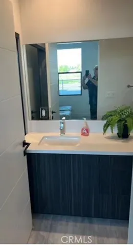 a bathroom with a sink and a toilet