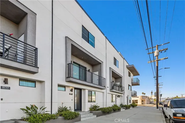 a front view of a building with a street