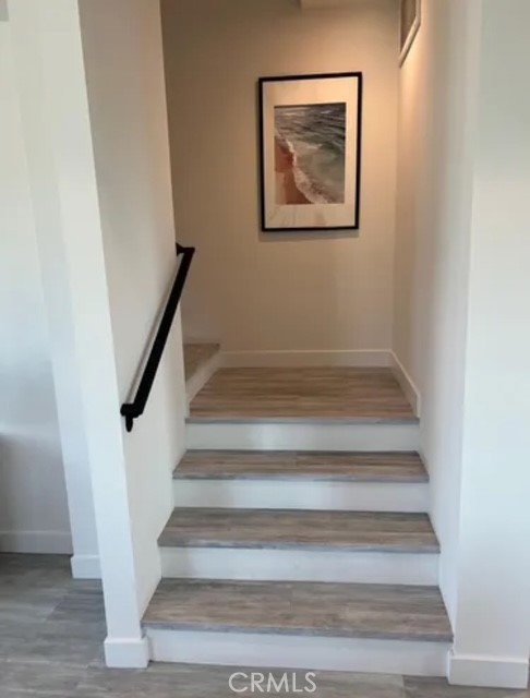 6719 Sepulveda Boulevard Van Nuys, CA 91406 - Photo 41 of 60 a view of staircase with white walls and a window