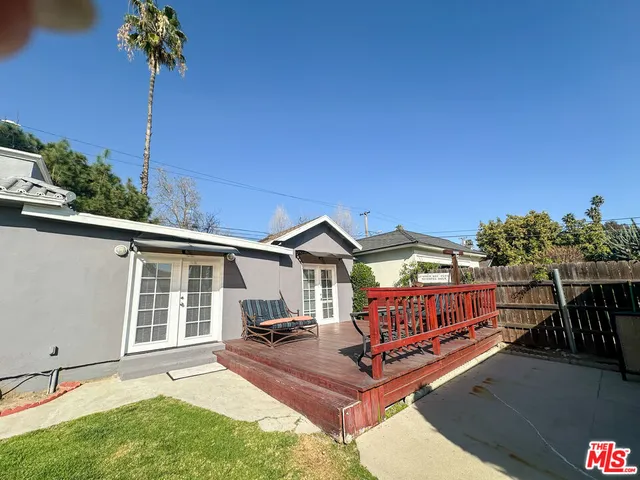 a view of house with outdoor seating space