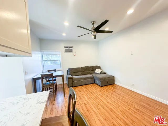 a bedroom with a bed and a table