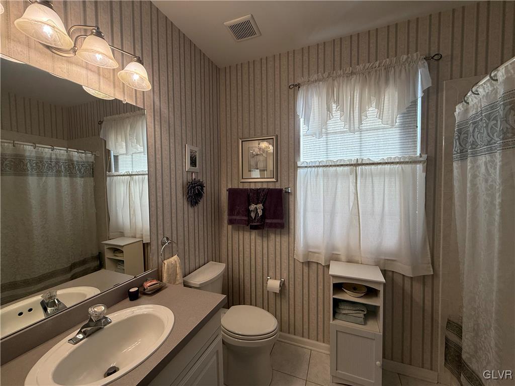 1847 Gregory Place Hellertown, PA 18055 - Photo 20 of 27 a bathroom with a sink toilet and shower