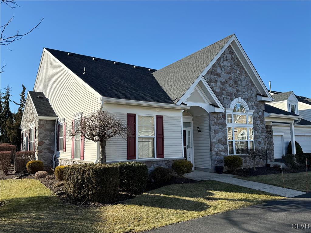 1847 Gregory Place Hellertown, PA 18055 - Photo 2 of 27 a front view of a house with a yard
