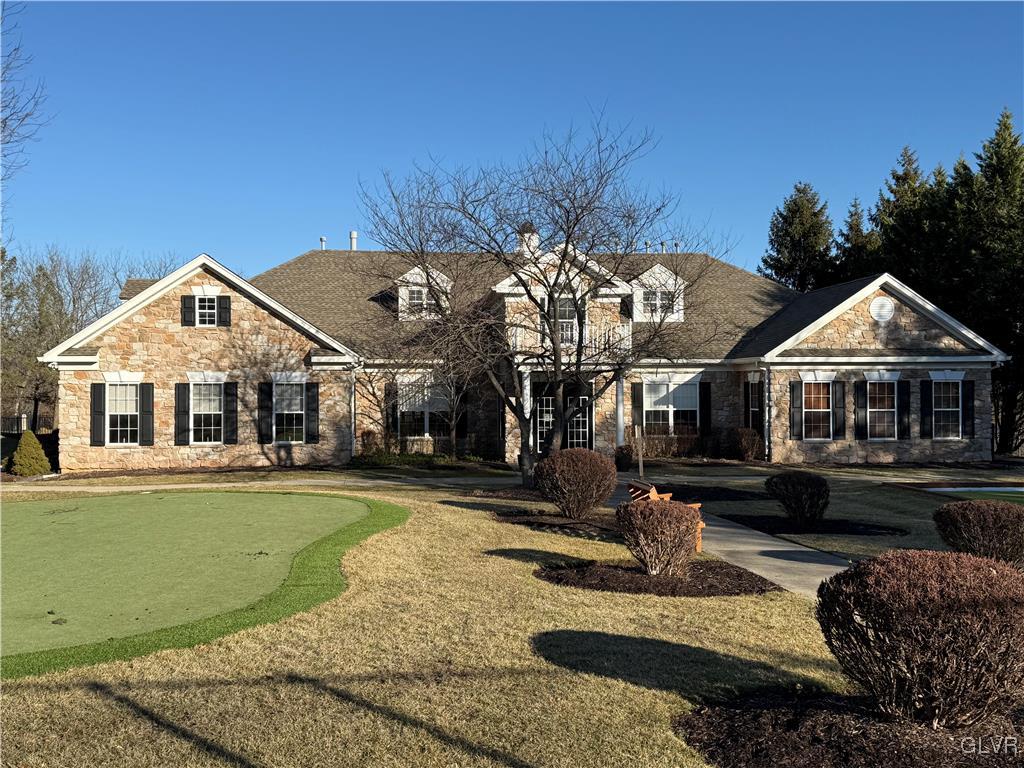 1847 Gregory Place Hellertown, PA 18055 - Photo 25 of 27 a front view of a house with a yard table and chairs