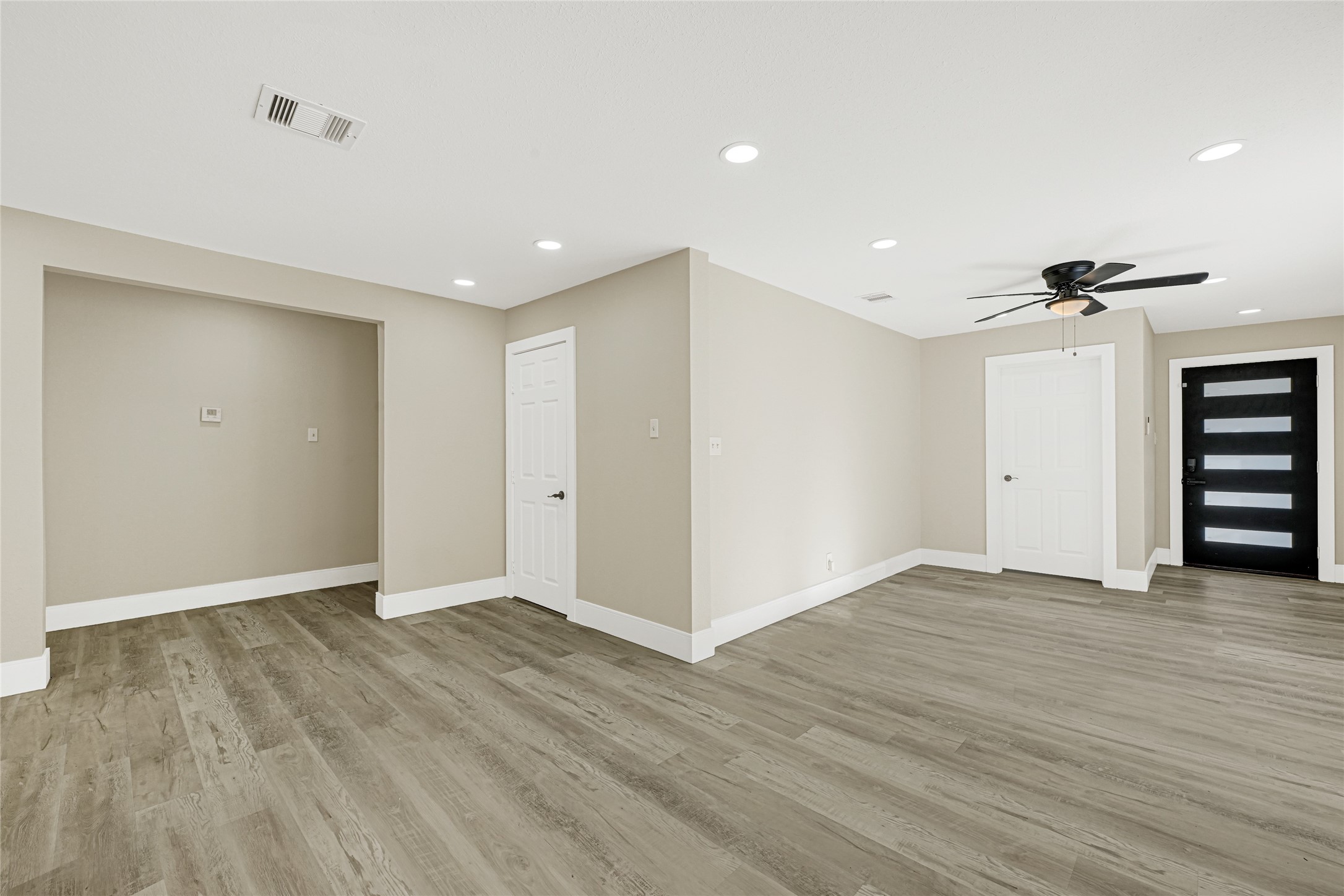 3510 Nagle Street Houston, TX 77004 - Photo 10 of 26 a view of an empty room with wooden floor