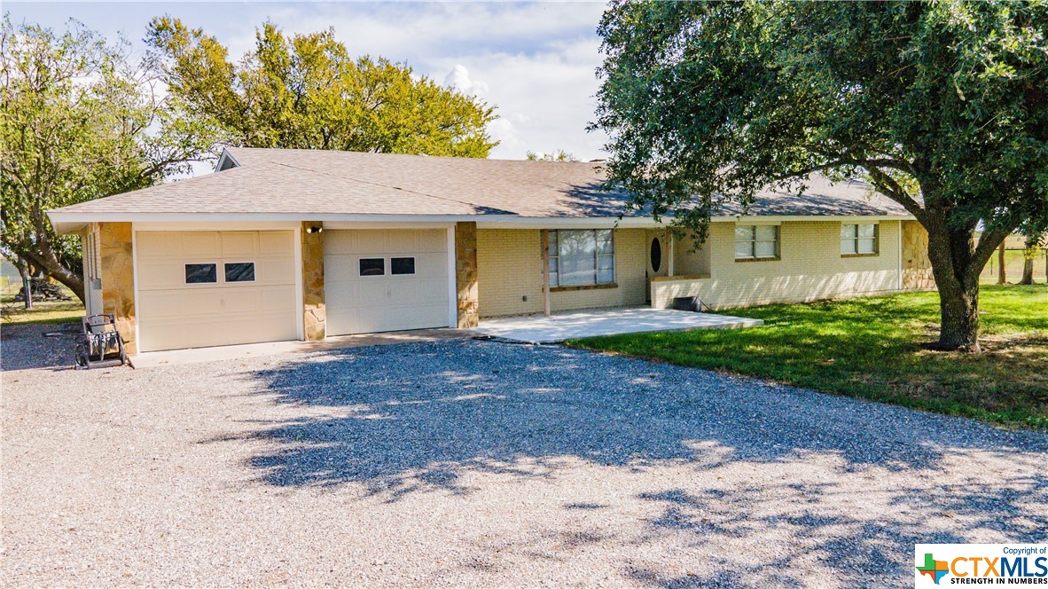 5549 Rabbit Road Temple, TX 76501 - Photo 1 of 1 a front view of a house with a garden