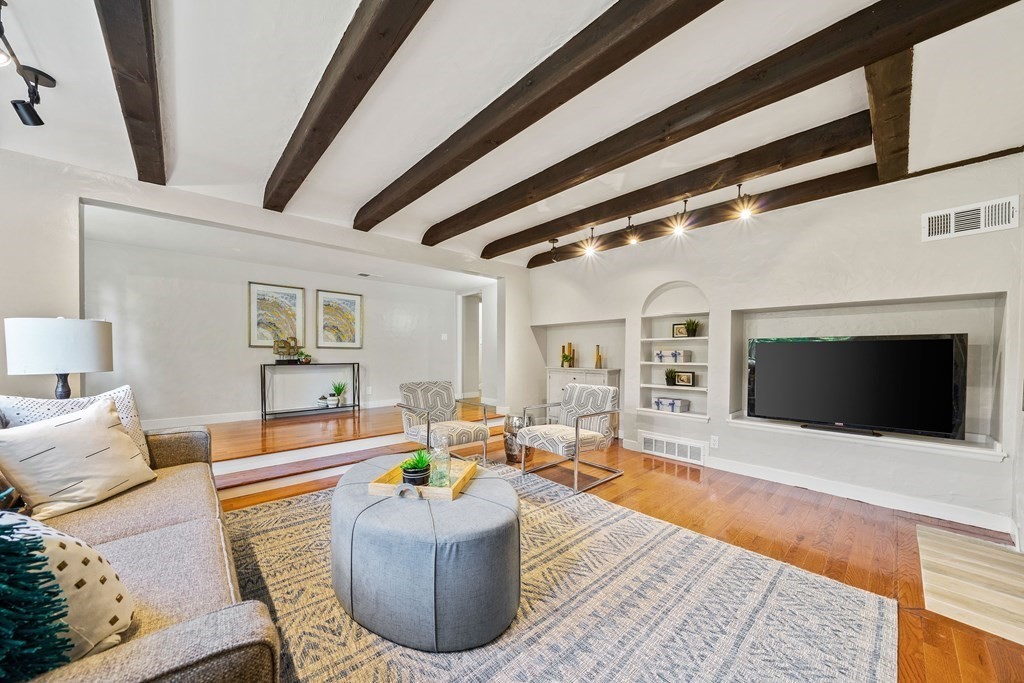 70 Burdean Road Newton, MA 02459 - Photo 1 of 38 a living room with furniture and a flat screen tv