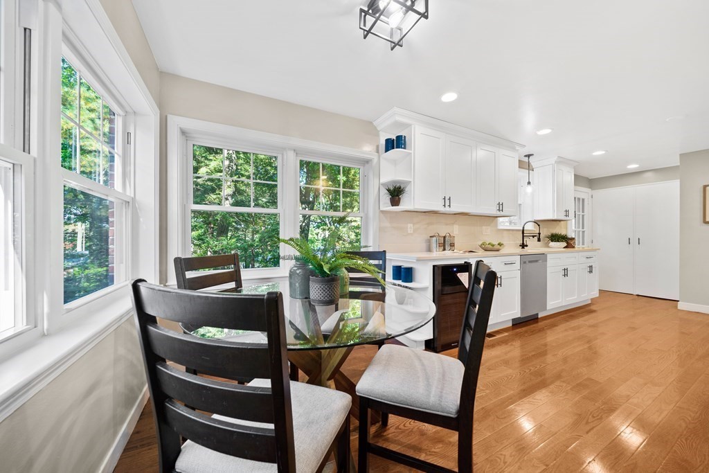 70 Burdean Road Newton, MA 02459 - Photo 11 of 38 a dining room with furniture and a large window
