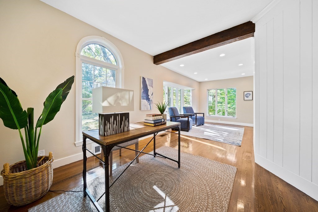 70 Burdean Road Newton, MA 02459 - Photo 17 of 38 a living room with furniture a table and a potted plant
