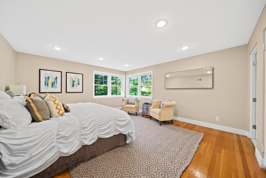 70 Burdean Road Newton, MA 02459 - Photo 23 of 38 a bedroom with a bed and wooden floor