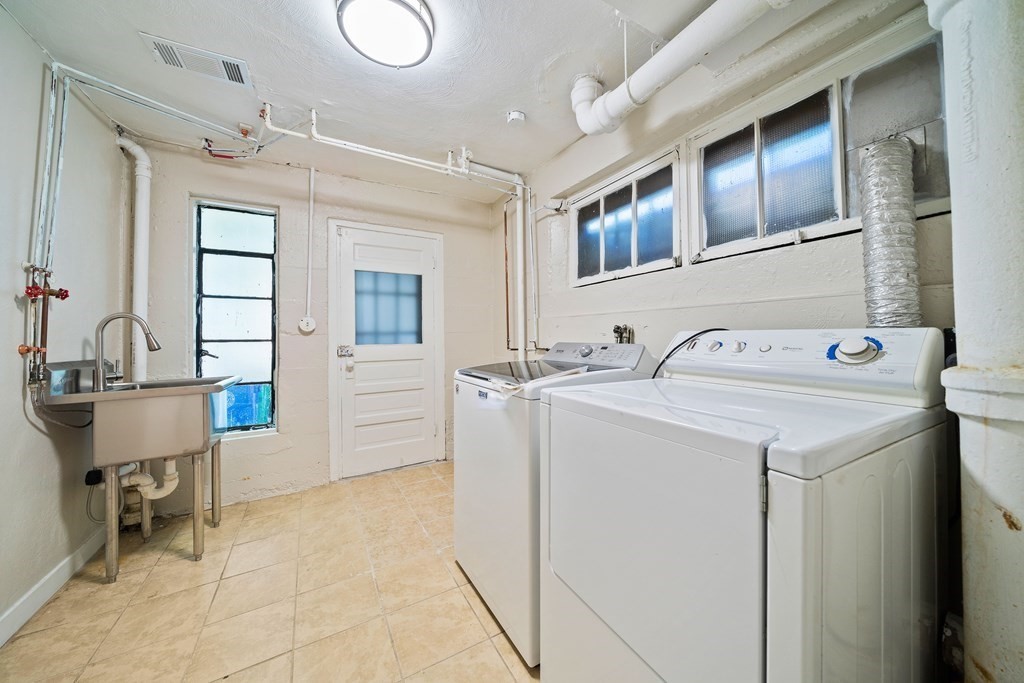 70 Burdean Road Newton, MA 02459 - Photo 31 of 38 a utility room with dryer and washer