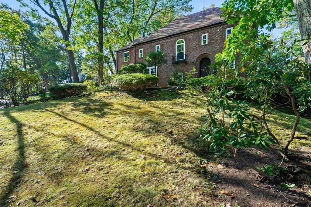 70 Burdean Road Newton, MA 02459 - Photo 32 of 38 a front view of a house with garden