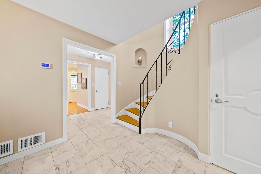 70 Burdean Road Newton, MA 02459 - Photo 6 of 38 a view of an entryway with staircase