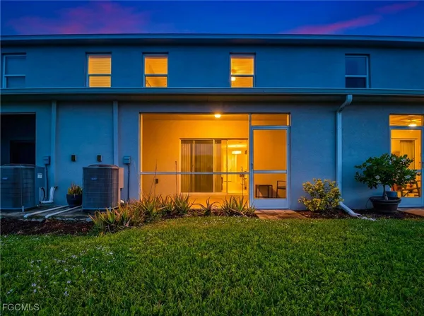 a view of front door of house with yard