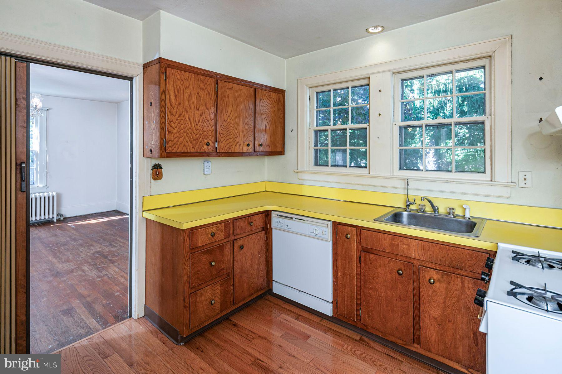 158 Carter Road Princeton, NJ 08540 - Photo 12 of 29 a kitchen with stainless steel appliances granite countertop a sink and a stove next to a window