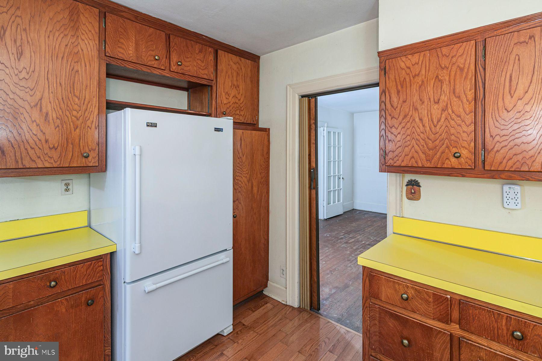 158 Carter Road Princeton, NJ 08540 - Photo 13 of 29 a white refrigerator freezer sitting inside of a kitchen