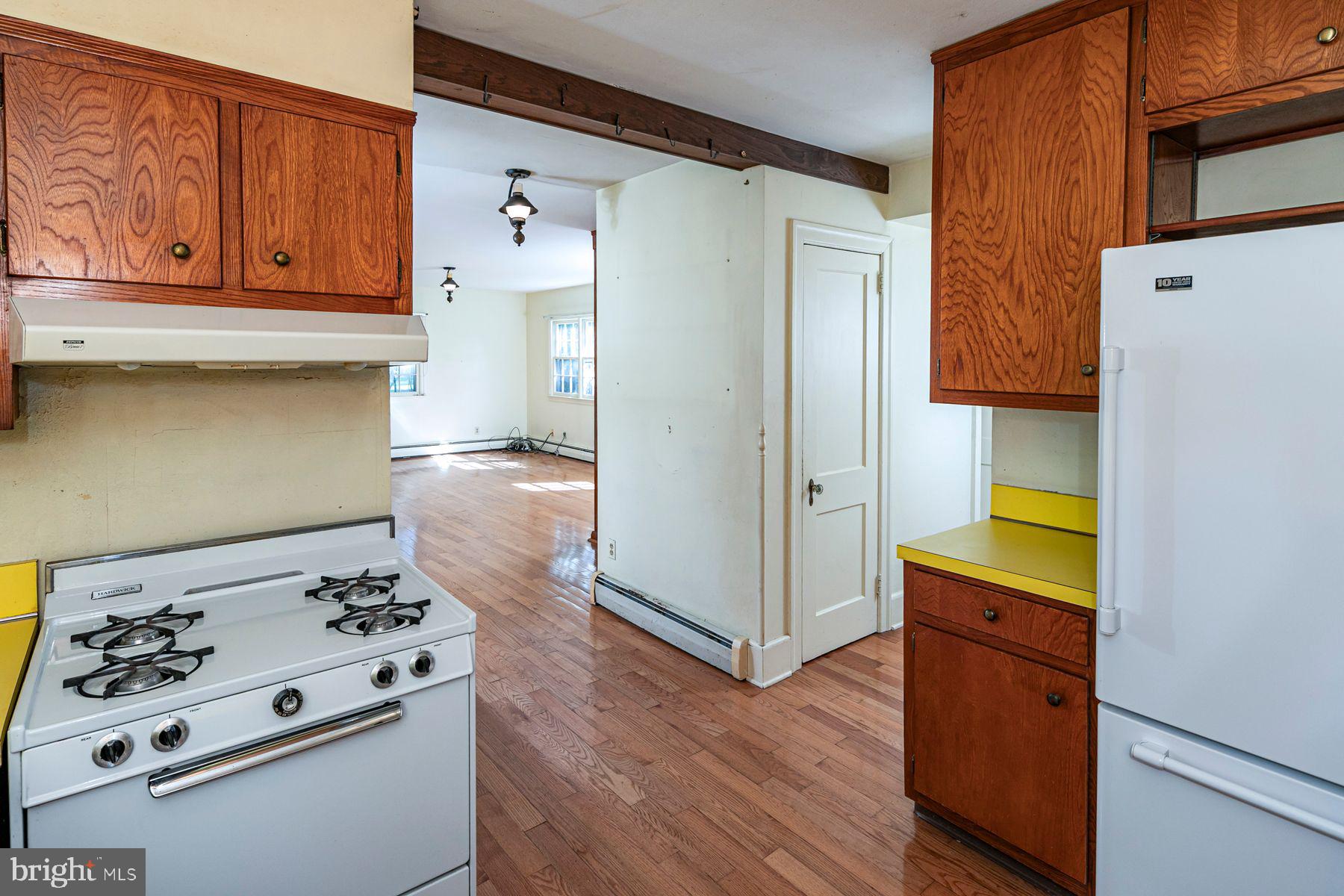 158 Carter Road Princeton, NJ 08540 - Photo 15 of 29 a kitchen with granite countertop cabinets and white appliances